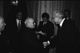 Il Presidente della Repubblica Francesco Cossiga riceve l'editore Edilio Rusconi con Padre Carlo Cremona per fare omaggio di una sua biografia su Sant'Agostino