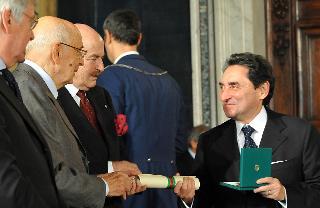 Il Presidente della Repubblica Giorgio Napolitano consegna le insegne di Cavaliere dell'Ordine &quot;Al Merito del Lavoro&quot; a Michele Rubino