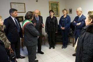 Il Presidente Giorgio Napolitano con i famiilari delle vittime dell'alluvione