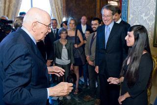 Il Presidente Giorgio Napolitano con Rossella Urru, accompagnata dal Ministro degli Esteri Giulio Terzi di Sant'Agata e dai familiari