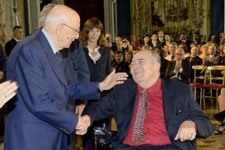 Il Presidente Giorgio Napolitano con Bernardo Bertolucci in occasione della presentazione dei candidati ai Premi David di Donatello 2013
