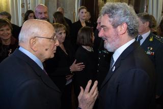 Il Presidente Giorgio Napolitano saluta il Maestro Nicola Piovani al termine del Concerto di Natale