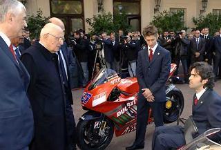 Il Presidente Giorgio Napolitano con a fianco l'Amministratore Delegato della Ducati Motor Holding, osserva le moto Ducati, presentate dal Direttore generale della Ducati Corse Filippo Preziosi, al centro il Campione del Mondo Moto GP 2007 Casey Joel Stoner.